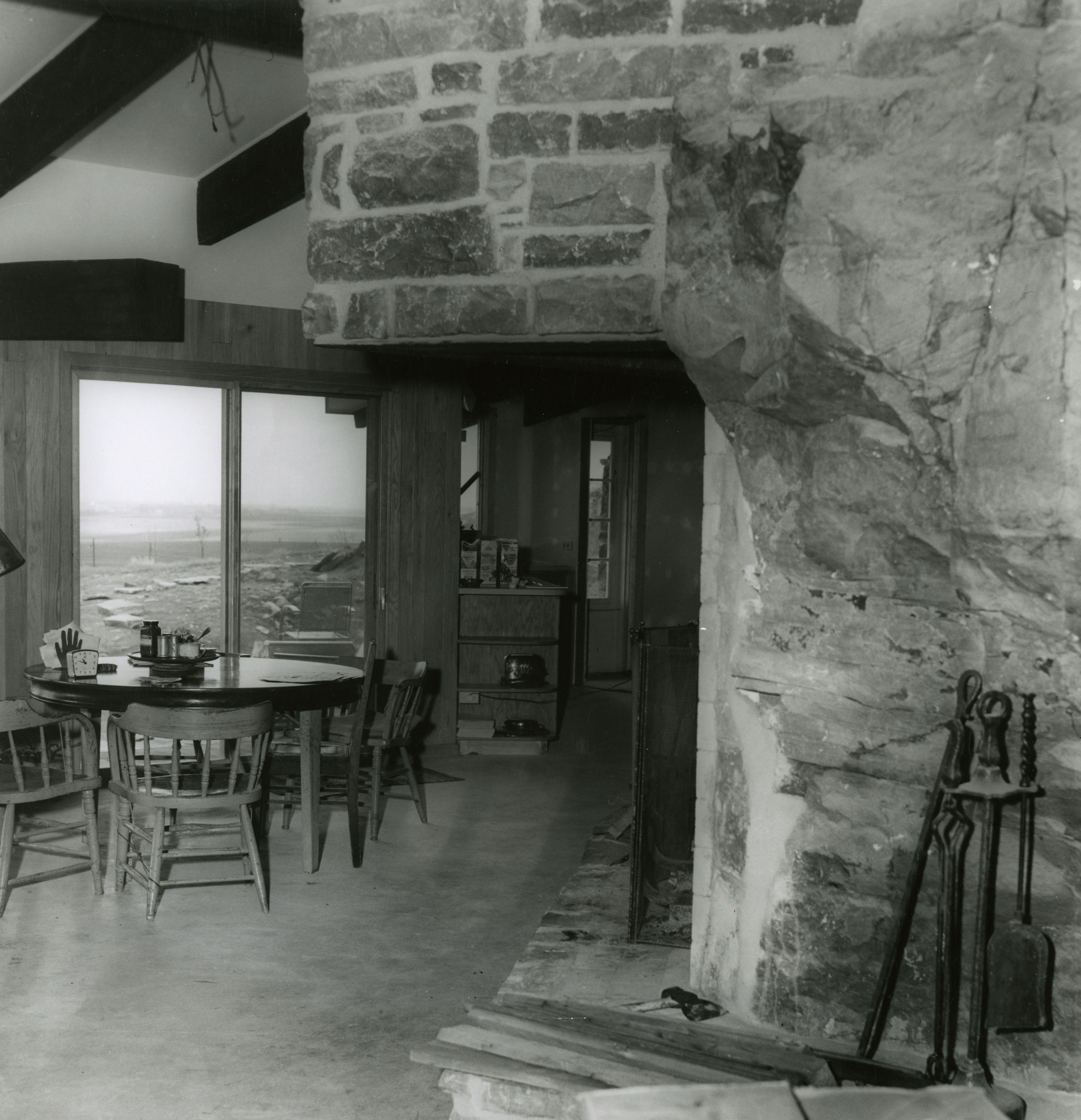 An inside view of the house, which combined stones quarried nearby and the exposed rocks against which the house was built.